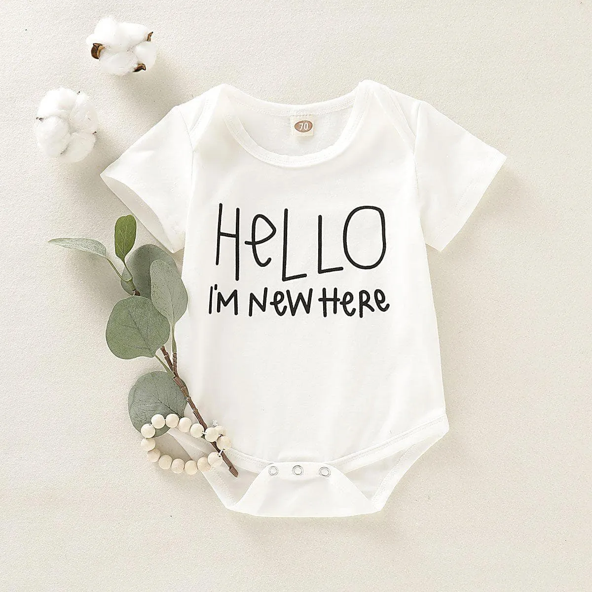 Baby's "Hello I AM NEW HERE" Bodysuit