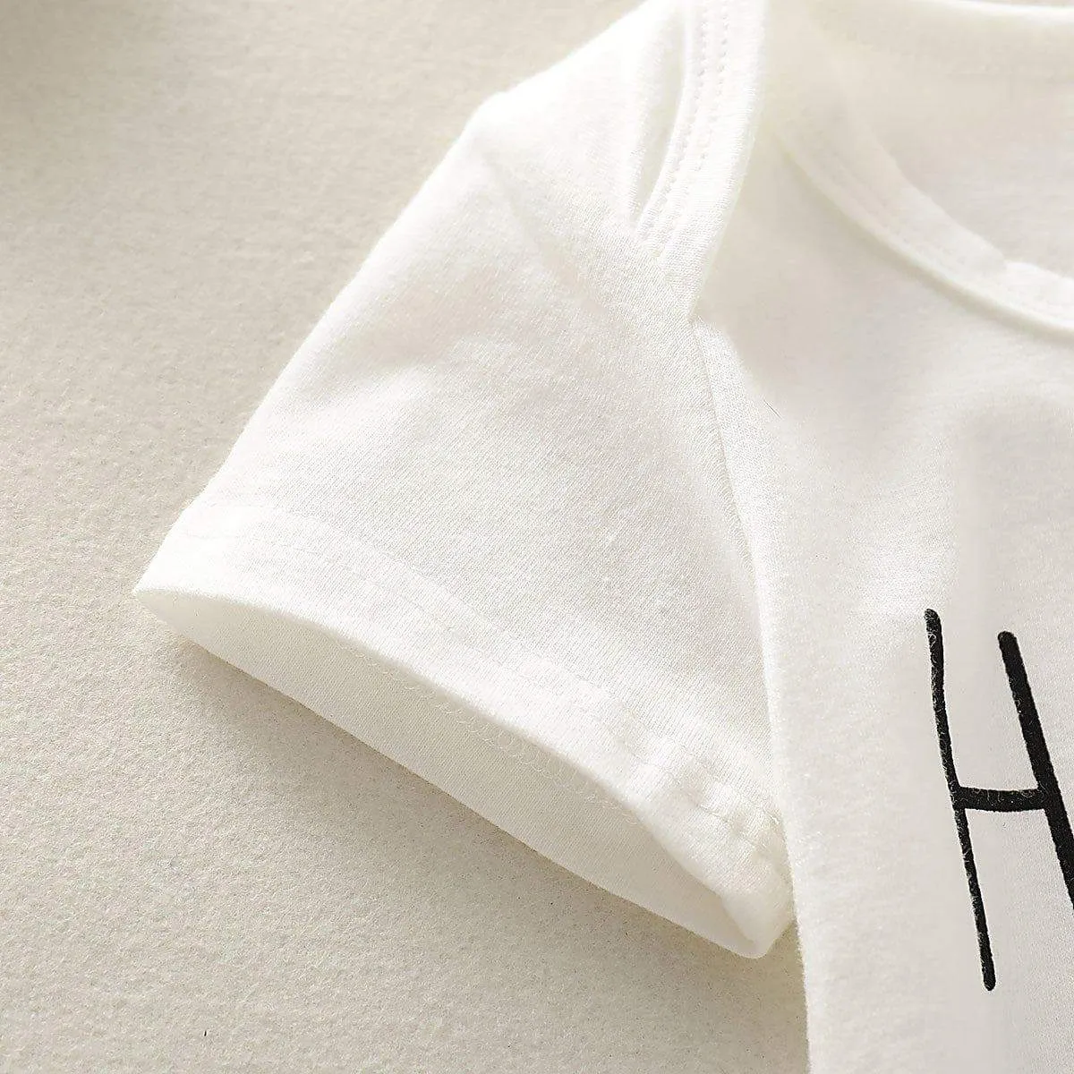 Baby's "Hello I AM NEW HERE" Bodysuit